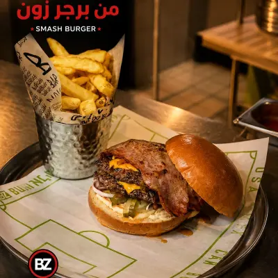 سماش برجر 200 غرام مع جبنة شيدر و9 فخذ أوز